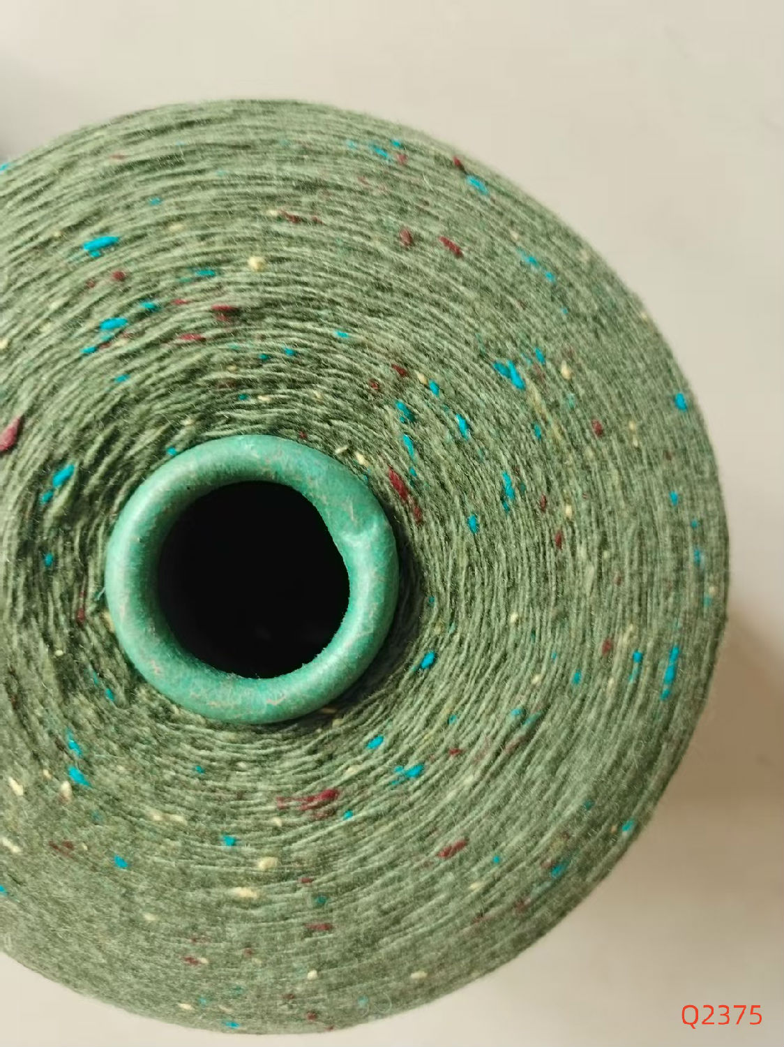 7.6支含40%羊毛軍綠色Q2375彩點紗