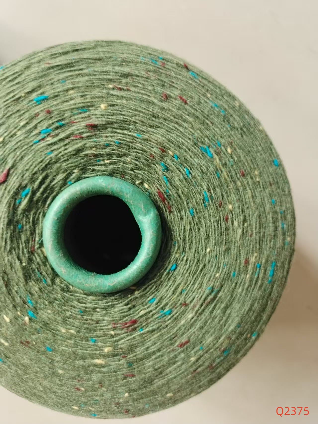 7.6支含40%羊毛軍綠色Q2375彩點紗